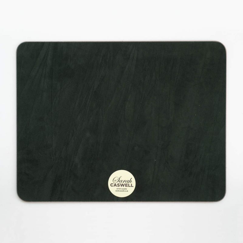 Green baize backing of oblong melamine tablemat