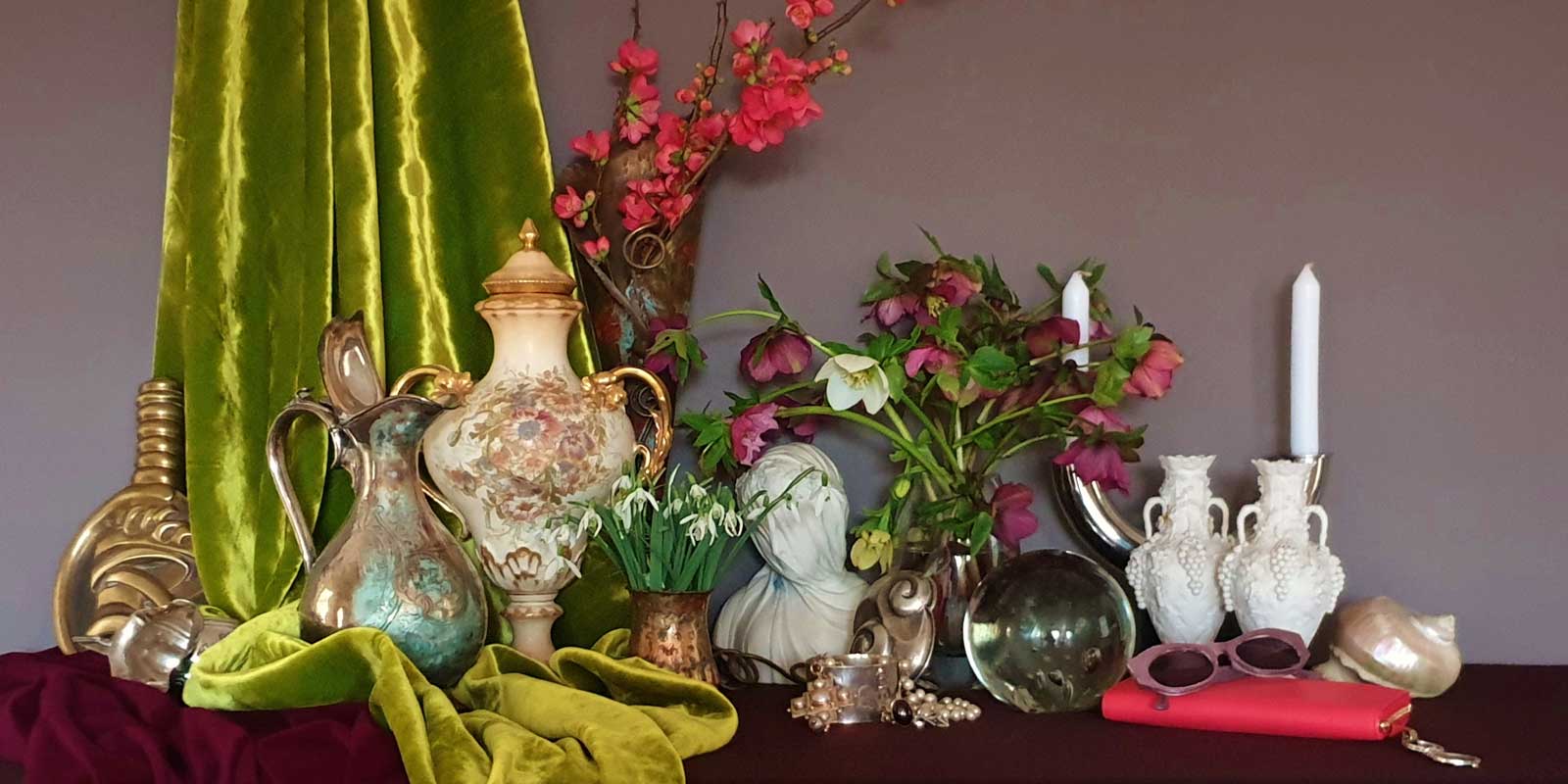 lime green silk velvet and treasured object which are inspiration to UK floral artist Sarah Caswell in a scene of baroque exuberant luxury and abundance