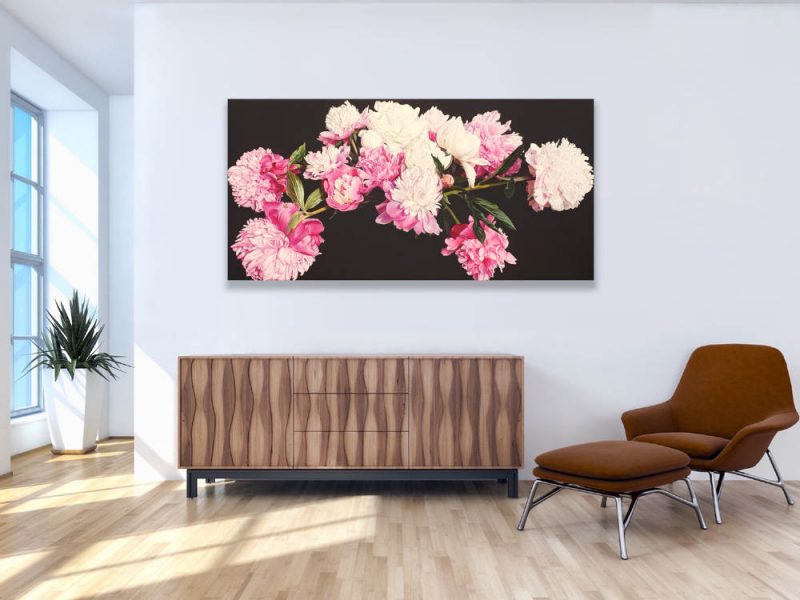 Original acrylic painting by floral artist Sarah Caswell. Pink and white peonies in bright sunshine on dark brown background shown in a home setting.